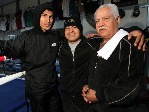 Mikey Garcia(L) poses with brother/trainer Robert Garcia(ctr) and father/trainer Eduardo Garcia(R) during training for his upcoming world title fight against WBO World Featherweight champion Orlando Salido, Saturday, Jan 19. Photo by  Chris Farina