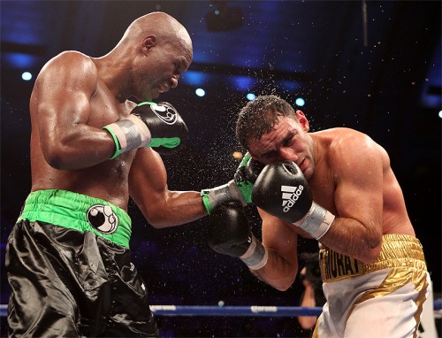 Bernard Hopkins (Left) lands a left hand en route to a unanimous decision victory against Karo Murat (Right) on October 26, 2013 in Boardwalk Hall in Atlantic City, New Jersey. Photos by Tom Hogan - Hoganphotos