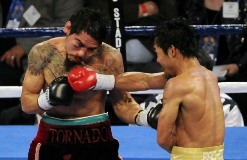 Manny Pacquiao of the Philippines (R) co